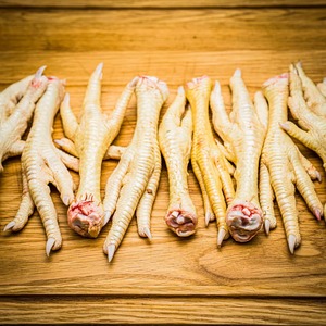 High-quality Frozen <b>Chicken</b> Feet IQF Packaging | Low-Fat Bulk Supply in Bags From Supplier Worldwide - Product Image 1