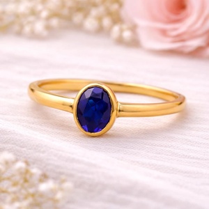 Bague délicate minimaliste chrétienne bohème en or 18 carats plaqué or avec saphir bleu ovale créé en laboratoire, bijoux faits à la main en pierres précieuses pour femme - Product Image 4
