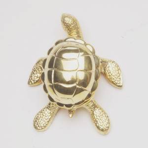 Centre de table élégant en métal en forme de tortue pour la décoration moderne de la maison et l'accentuation élégante d'une table basse. - Product Image 1