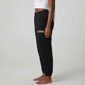 Pantalon de jogging en molleton noir pour femme avec taille élastique et cordon de serrage, coupe décontractée, vêtement de détente confortable - Product Image 3