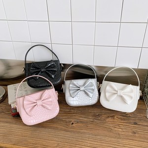 Sac à bandoulière pour enfants, sac à main mignon avec nœud de couleur unie, sac d'accessoires pour petites filles, nouveau modèle - Product Image 5