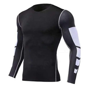 Service professionnel garantissant la conformité aux normes de ce rashguard pour homme à sublimation, séchage rapide, manches longues, en tissu polyester/nylon, pour la vente en gros. - Product Image 5