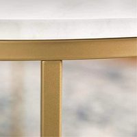Petite table basse ronde en marbre blanc naturel avec des veines grises et une base en acier géométrique en croix