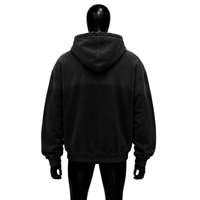 Sweat à capuche zippé noir avec motif 'Love', effet délavé vintage, style streetwear, coupe oversize, imprimé cœur rouge, unisexe, mode urbaine décontractée