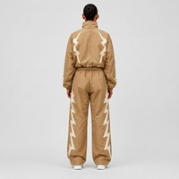 Survêtement beige à imprimé géométrique pour femmes, coupe ample, style sportif, avec fermeture à cordon et poches latérales