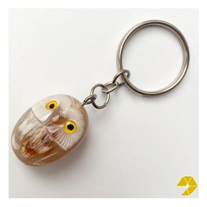 Porte-clés unique en corne naturelle pour cadeaux de mariage et d'anniversaire, écologique, sculpté à la main, motif animal, export en gros du Vietnam - Product Image 1