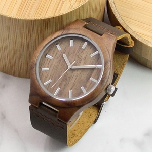 Orologio da polso <span class=keywords><strong>in</strong></span> <span class=keywords><strong>legno</strong></span> di noce naturale realizzato a mano <span class=keywords><strong>in</strong></span> vera pelle di mucca orologio <span class=keywords><strong>in</strong></span> <span class=keywords><strong>legno</strong></span> regalo di anniversario per lui o lei - Product Image 1