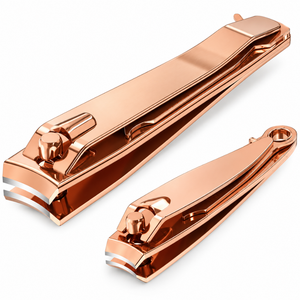 Coupe-ongles de luxe en acier inoxydable rose gold, lame courbée de 15 mm, pointe arrondie, pour usage adulte. - Product Image 1