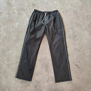 Pantalon de survêtement noir en toile de haute qualité pour homme, taille élastique, avec lacets latéraux, séchage rapide, léger, style formel hiver - Product Image 4