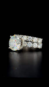 แหวนเพชรสำหรับงานแต่งงานสีเงิน925แบบปรับแต่งได้5Ct มี4กรงเล็บ VVS1เพชรโมอิสซาไนต์สำหรับเป็นของขวัญ - Product Image 3