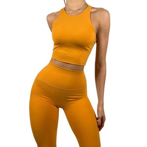 เสื้อกล้ามครอปออกกำลังกายไร้ตะเข็บสำหรับผู้หญิงแบบขายส่งตามสั่ง เนื้อผ้าริบ ระบายอากาศได้ดี ผลิตจากไนลอน เหมาะสำหรับโยคะและฟิตเนส - Product Image 1