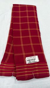 A lightweight, semi-sheer fabric with a slightly crinkled texture A pattern <b>formed</b> by intersecting horizontal and vertical lines - Product Image 2