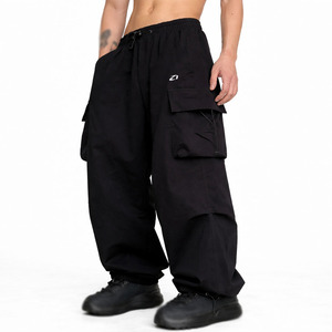 Pantalon cargo noir oversize pour homme, coupe large, en nylon, style streetwear, pantalon utilitaire, coupe ample, sur mesure OEM, pantalon homme - Product Image 1