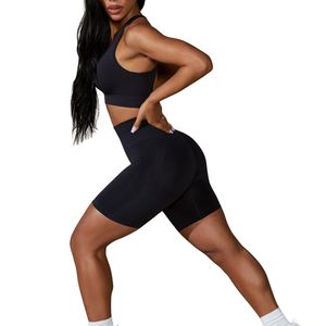 ชุดเซ็ตเสื้อชั้นในกีฬาและกางเกงขาสั้นเอวสูงสำหรับผู้หญิง ขายส่ง เนื้อผ้าระบายอากาศ เหมาะสำหรับออกกำลังกาย โยคะ ฟิตเนส ชุดออกกำลังกายฤดูร้อน ชุดสองชิ้น - Product Image 2