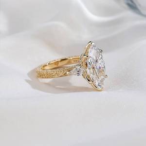 แหวนเพชรทรงมาร์คีส์ทอง 14K ประดับเพชรทรงทริลเลียนด้านข้าง เครื่องประดับหมั้นสำหรับผู้หญิงแบบคลาสสิก - Product Image 2