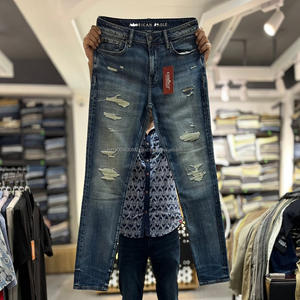Vêtements en gros en stock, jeans pour hommes avec décoration boutonnée, patchwork, coupe slim, jeans en denim déchirés pour hommes, pantalon en stock - Product Image 5