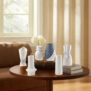 Современная фарфоровая ваза для украшения дома, с узором в виде банта, с цветочным узором, матовая непрозрачная глазурь для отелей, керамический материал для повседневного использования