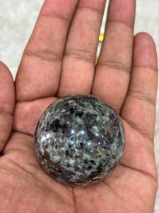 Yooperlite <b>sphere</b> with smoky gray stone body vibrant orange fluorescent glow polished curvature and distinctive mineral display - Product Image 5