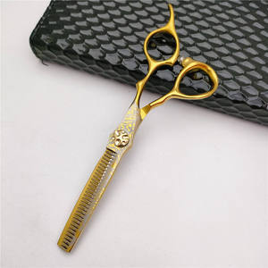 กรรไกรตัดผมมืออาชีพสแตนเลสญี่ปุ่นเคลือบทองคำ รับทำโลโก้ขายส่ง - Product Image 4