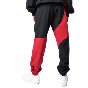 Ensemble de survêtement coupe-vent imprimé color block rouge et noir, séchage rapide, respirant, avec cordon de serrage, vêtements de sport personnalisables avec logo - Product Image 3