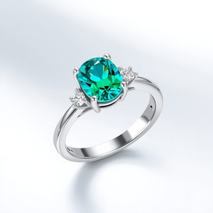 Anillo de Oro Blanco de 14K con Gema de Corte Ovalado Color Paraíba, Fabricante de Joyería Fina Personalizada - Product Image 1