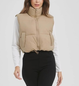 Gilet matelassé sans manches beige pour femme, col montant, fermeture éclair, vêtement d'extérieur décontracté, longueur normale, couleur unie, polyester - Product Image 1