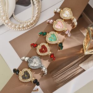 นาฬิกาข้อมือควอตซ์รูปหัวใจน่ารัก แฟชั่นเรียบง่าย หรูหรา ประดับเพชร หน้าปัดกระจก สำหรับทุกเพศ กันน้ำ - Product Image 3