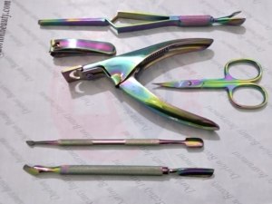 ชุดอุปกรณ์ทำเล็บเคลือบสีรุ้งขายดีที่สุด ผลิตจากสแตนเลสสตีล พร้อมตราสินค้าส่วนตัว ที่ตัดหนังกำพร้าและที่ดันหนังกำพร้า พร้อมที่ตัดเล็บ - Product Image 1