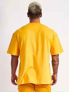 Camiseta de algodón premium para hombre, nuevo estilo, hombros caídos, corte relajado informal, manga corta, transpirable, de secado rápido, color liso, para uso diario. - Product Image 2