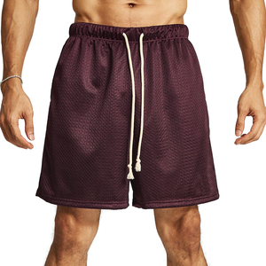 Pantalones cortos de malla elegantes para hombre con cintura con cordón, de secado rápido y tela elástica. - Product Image 1