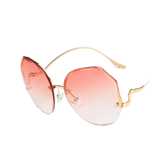 Gafas de Sol de Moda de Lujo al por Mayor, Montura Poligonal sin Aro, Protección UV, Unisex, para Viajes y Conducción - Product Image 2