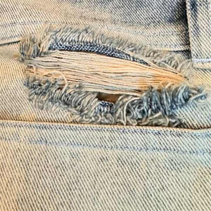 Shorts cargo amples en denim délavé vintage, 100 % coton, imperméables et respirants, personnalisables avec logo et impression spéciale - Product Image 4