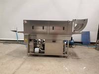Laveuse de paniers, caisses, palettes, bacs et cages à volailles