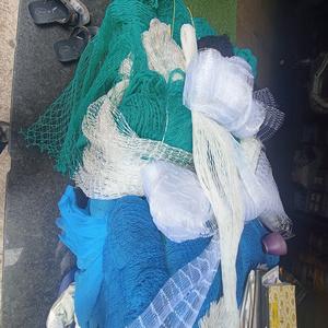 Fil de pêche en nylon multi-monofilament, multicolore, en forme allongée, issus de déchets de filets de pêche, produit en plastique recyclé, Autriche - Product Image 1