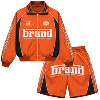 Ensemble short et coupe-vent orange pour homme, personnalisé avec logo, en satin tissé respirant, décontracté et sportif, avec fermeture éclair, collection printemps 2026