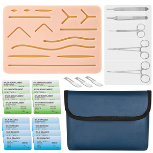 Kit d'entraînement à la suture réutilisable de qualité supérieure pour fournisseurs : Outils en acier inoxydable, coussinets en silicone durables avec plaies pré-découpées - Product Image 1