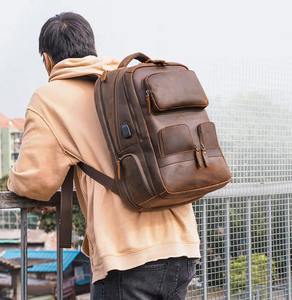 Mochila Ligera de Cuero Genuino para Hombre y Mujer, Gran Capacidad, Bolsa para Portátil, Elegante Mochila de Viaje con Cierre y Múltiples Bolsillos - Product Image 1