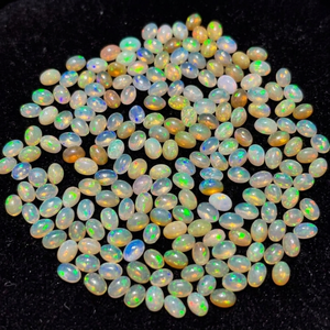 โอปอลเอธิโอเปียสีขาวธรรมชาติ รูปไข่ ทรงหลวม  มีสีสันเปลี่ยนแปลง  รับรองโดยบุคคลที่สาม น้ำหนัก 0.50-0.90 กะรัต สำหรับทำเครื่องประดับ - Product Image 2