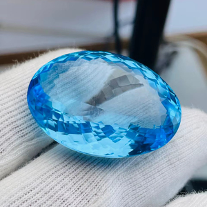 Topaze bleue naturelle, taille ovale, grande taille 99,19 carats, qualité AAA, lustre parfait, disponible à prix avantageux. - Product Image 1