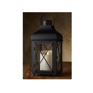 Lanterne à bougie en métal, décoration exclusive pour la maison, conçue pour rehausser l'ambiance résidentielle avec une lueur de bougie élégante - Product Image 1