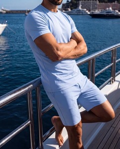 Conjunto Deportivo de Verano de 2 Piezas para Hombre HADIA SHAHID de Alta Calidad, Transpirable, Estilo Urbano, Camiseta Brillante de Poliéster/Algodón Premium - Product Image 1