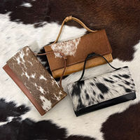 Nouvelle vente chaude Designer en cuir de vachette véritable pochette sac à main pochette portefeuille cheveux noirs sur cacher portefeuilles en cuir cadeau pour les femmes