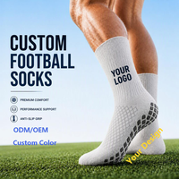 Chaussettes de football personnalisées à forte valeur ajoutée Chaussettes à prise en main d'usine Chaussettes antidérapantes