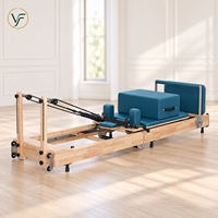 Reformer de Pilates pliable, structure en chêne massif et ressorts à câble, Reformer de Pilates pour salles d'entraînement partagées