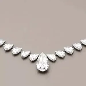 Collar de tenis para mujer con moissanita de corte pera de 25 quilates, chapado en oro blanco de 14k, engaste de garra de plata - Product Image 1