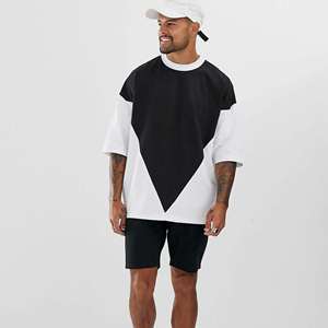 Camisa moderna de gran tamaño con diseño de hombros caídos y corte holgado elegante para amantes del estilo casual urbano. - Product Image 1