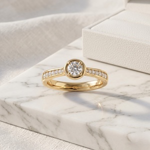 Bague solitaire ronde 0,55 CTW - Monture demi-cannelée - Product Image 1