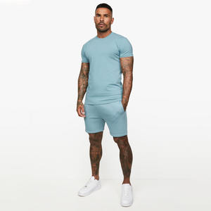 Conjunto de camiseta y pantalones cortos unisex de verano, nuevo estilo, corte y confección, logotipo personalizado de alta calidad, 100% algodón orgánico, secado rápido, conjunto de verano para hombre - Product Image 1