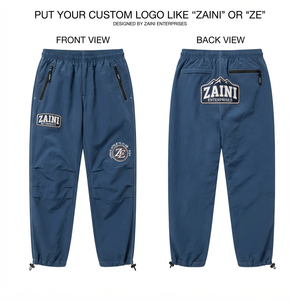 Pantalon coupe-vent pour homme en tissu nylon Taslon premium 120 GSM, taille élastique, logo brodé personnalisé, design à panneaux affusés - Product Image 1