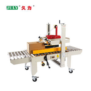 Máquina <span class=keywords><strong>de</strong></span> sellado <span class=keywords><strong>de</strong></span> cartón plegable con aletas automáticas JULY, sellador <span class=keywords><strong>de</strong></span> cinta <span class=keywords><strong>de</strong></span> caja <span class=keywords><strong>de</strong></span> altura ajustable - Product Image 1